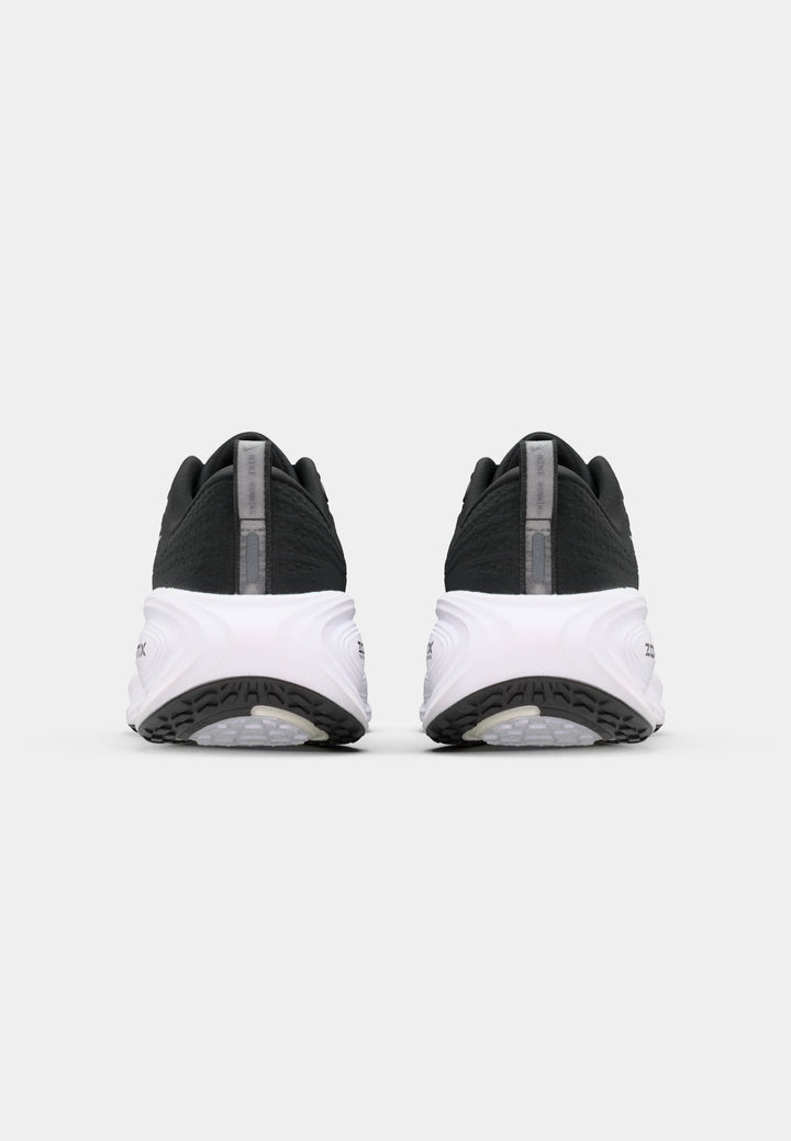 Nike VOMERO PLUS - Road running shoes