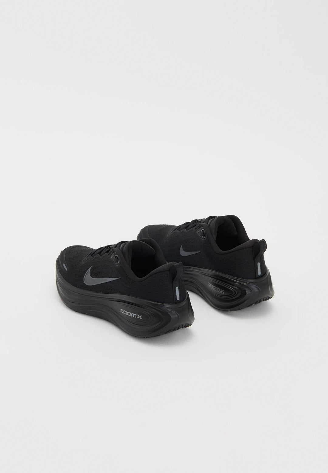 Nike VOMERO PLUS - Road running shoes