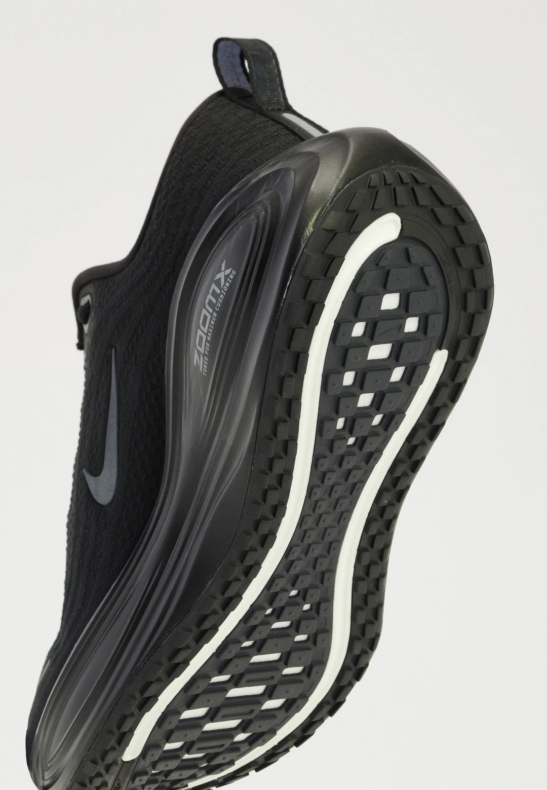 Nike VOMERO PLUS - Road running shoes